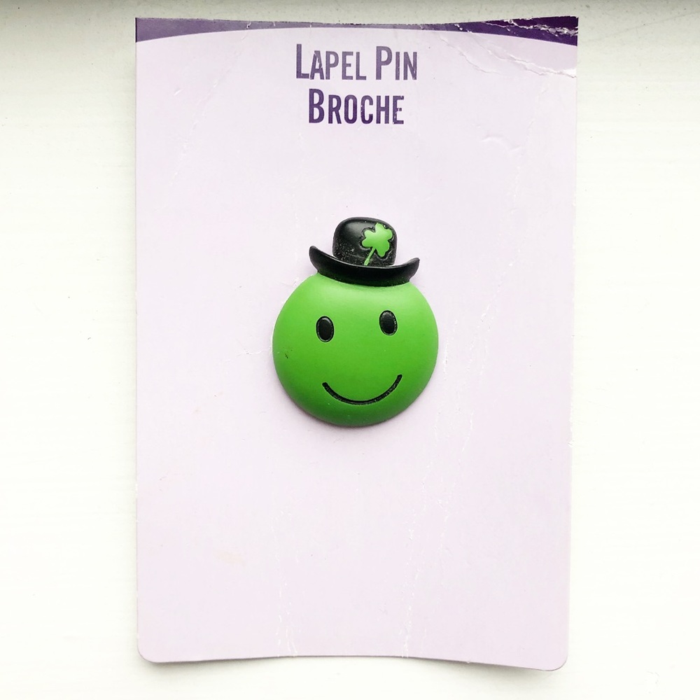 Vintage green leprechaun smiley face lapel pin